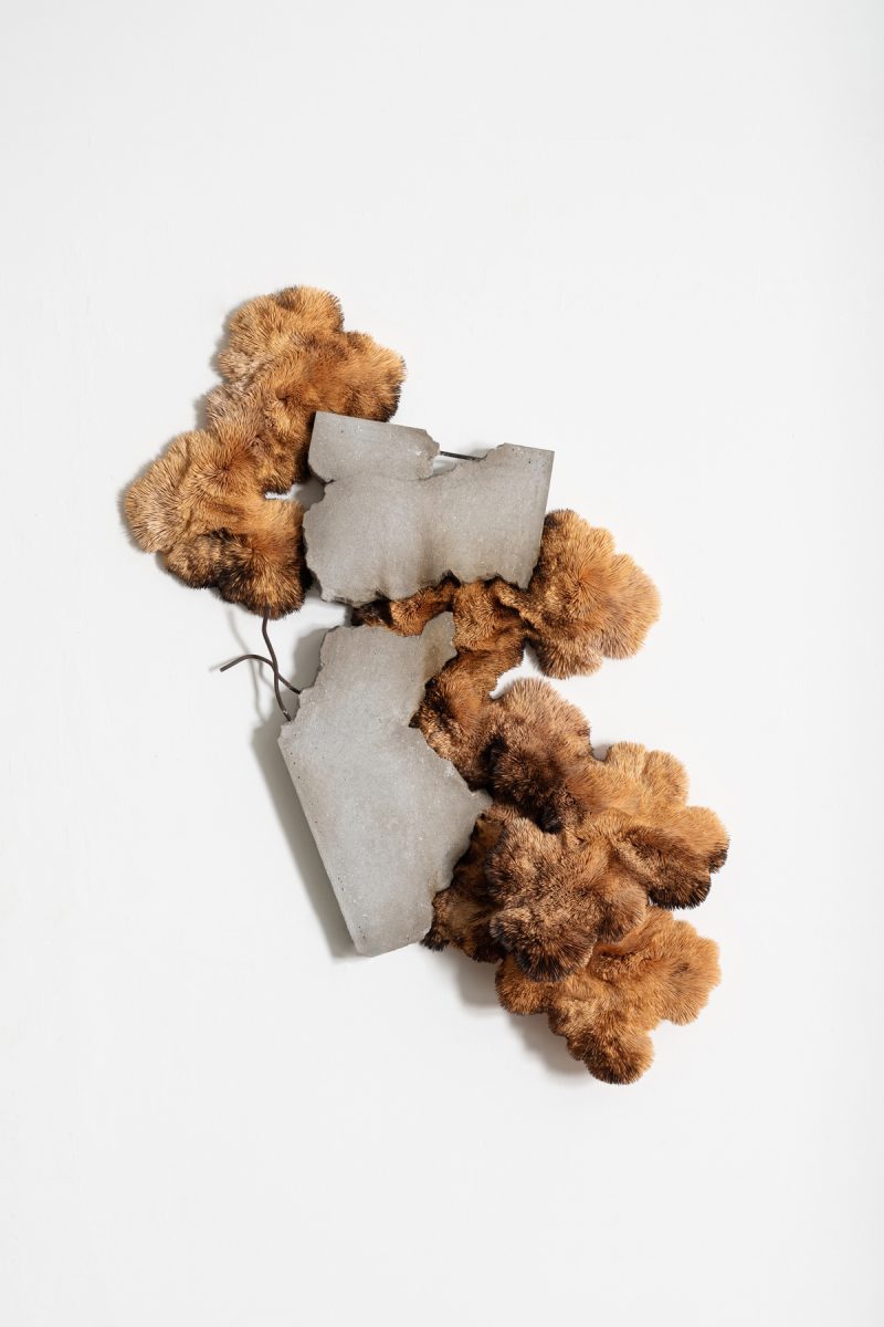 Fractured into form 2025, Burnt and Unburnt Bamboo and Birch Wood Toothpicks held in Polyurethane Sealant, Glass Fibre Reinforced Concrete with Used Motor Car Oil and Rebar 159 x 120 x 27 cm Photographer: Matt Slater, Courtesy Piero Atchugarry Gallery and the Artist