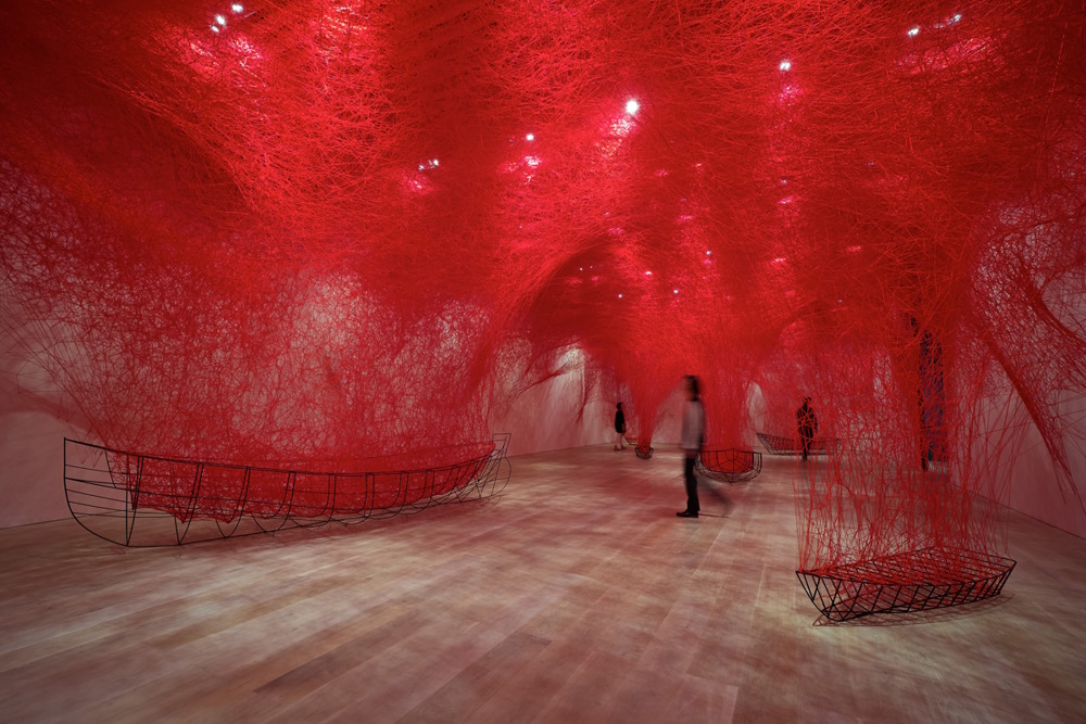 Shiota Chiharu, Uncertain Journey 2016/2019 Metal frame, red wool Dimensions variable Installation view: Shiota Chiharu: The Soul Trembles, Mori Art Museum, Tokyo, 2019 Photo: Sunhi Mang Photo courtesy: Mori Art Museum, Tokyo