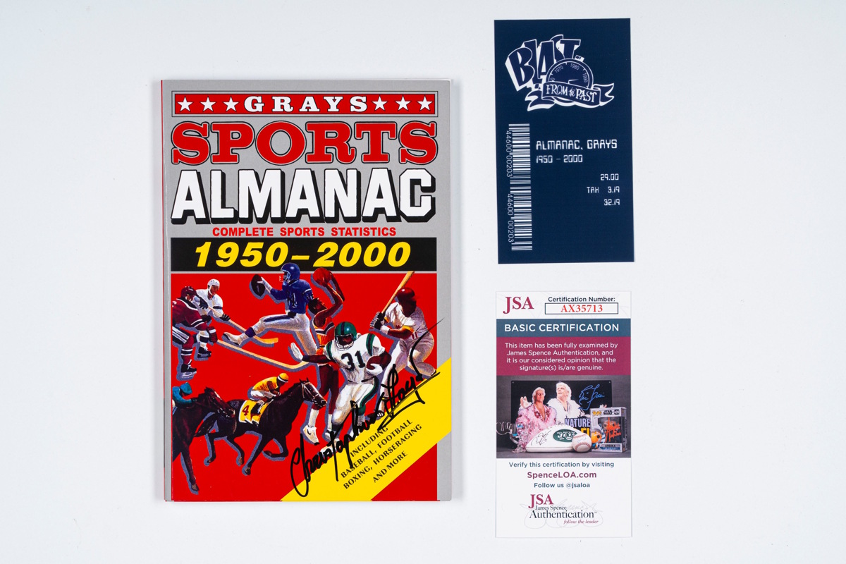 Lotto 122 - Christopher Lloyd – Ritorno al futuro - Almanacco Sportivo firmato – Cert. JSA